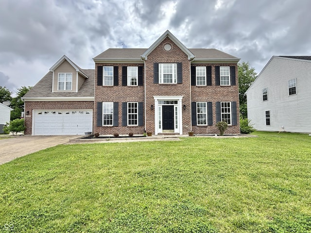 5571 Auburndale Dr, Bargersville, IN 46106 - colonial house with brick siding, concrete driveway, a front yard, and a garage