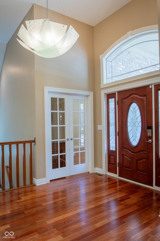 23119 Sonoma Ln, Cicero, IN 46034 - entrance foyer featuring wood finished floors, french doors, and a towering ceiling