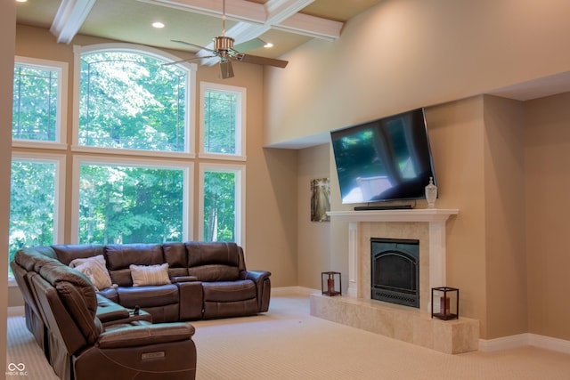 23119 Sonoma Ln, Cicero, IN 46034 - living room featuring carpet flooring, a fireplace, beamed ceiling, coffered ceiling, and a towering ceiling