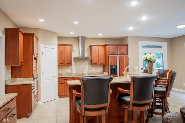 23119 Sonoma Ln, Cicero, IN 46034 - kitchen with wall chimney exhaust hood, paneled built in refrigerator, oven, brown cabinetry, and recessed lighting