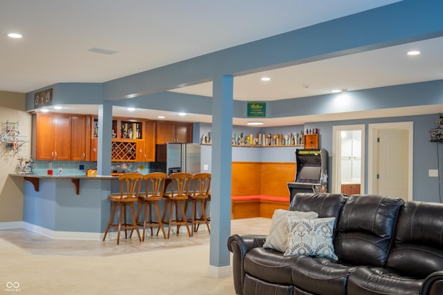 23119 Sonoma Ln, Cicero, IN 46034 - living area featuring bar with sink and recessed lighting