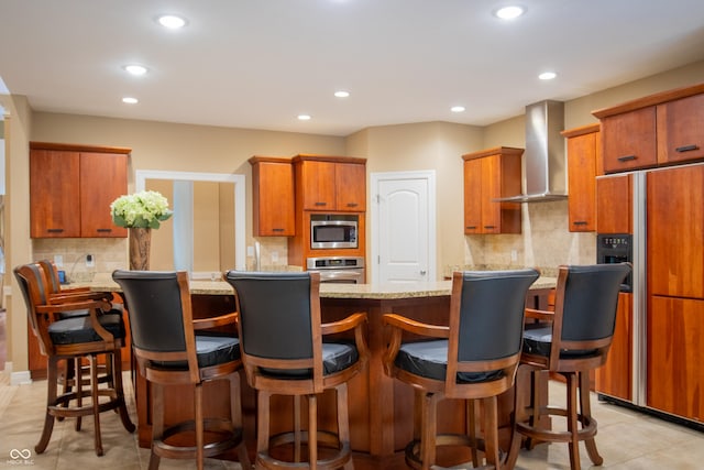 23119 Sonoma Ln, Cicero, IN 46034 - kitchen featuring wall chimney exhaust hood, built in appliances, decorative backsplash, recessed lighting, and light stone counters