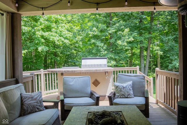 23119 Sonoma Ln, Cicero, IN 46034 - wooden deck with an outdoor fire pit and area for grilling