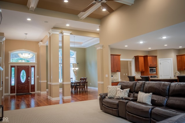 23119 Sonoma Ln, Cicero, IN 46034 - living area with decorative columns, dark wood-style floors, recessed lighting, a ceiling fan, and beamed ceiling