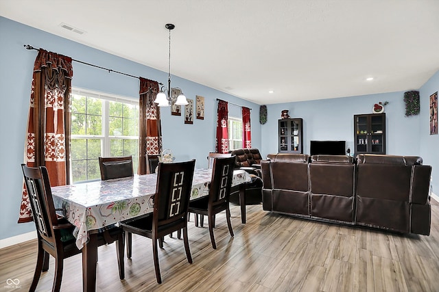1571 N Creekwater Pass, Greenfield, IN 46140 - dining space featuring a chandelier, light wood-type flooring, and recessed lighting