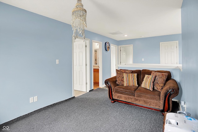 1571 N Creekwater Pass, Greenfield, IN 46140 - carpeted living room with a chandelier and recessed lighting
