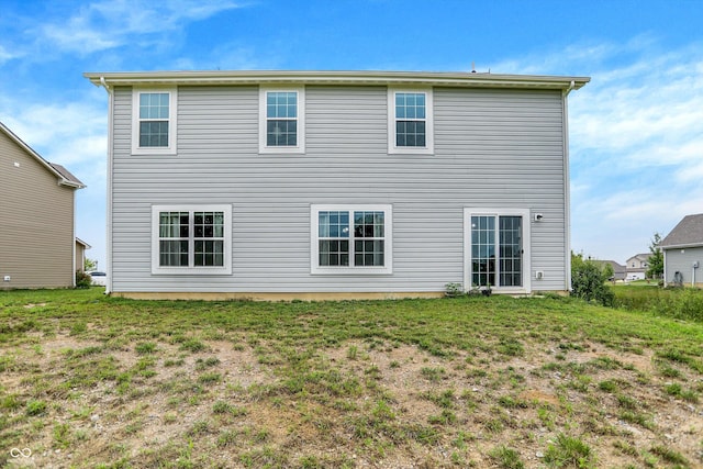 1571 N Creekwater Pass, Greenfield, IN 46140 - rear view of house featuring a yard