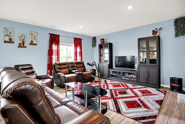 1571 N Creekwater Pass, Greenfield, IN 46140 - living room featuring light wood-type flooring and recessed lighting
