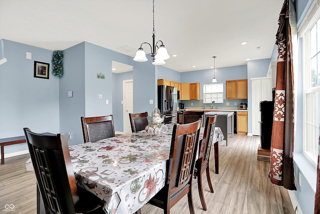 1571 N Creekwater Pass, Greenfield, IN 46140 - dining room with a chandelier and recessed lighting