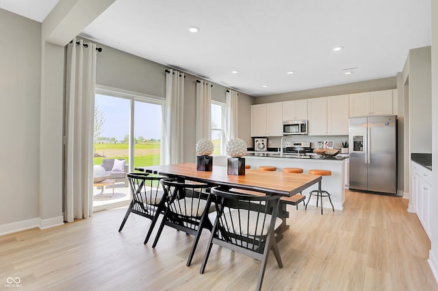 16876 Daly Dr, Noblesville, IN 46062 - dining room featuring light wood-style floors and recessed lighting