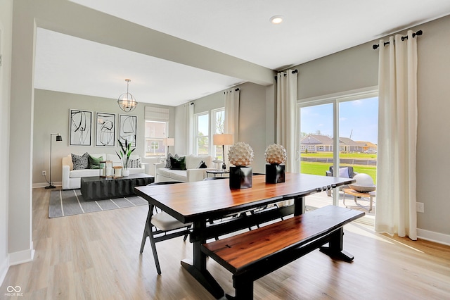 16876 Daly Dr, Noblesville, IN 46062 - dining space with light wood-style flooring, recessed lighting, and a chandelier