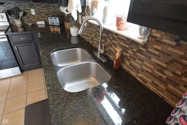 12389 Titans Dr, Fishers, IN 46037 - kitchen view of backsplash and dark stone counters