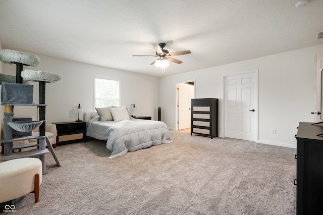 284 E Silver St, Knightstown, IN 46148 - carpeted bedroom with a textured ceiling and a ceiling fan