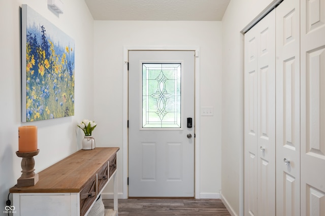 284 E Silver St, Knightstown, IN 46148 - foyer featuring wood finished floors and baseboards