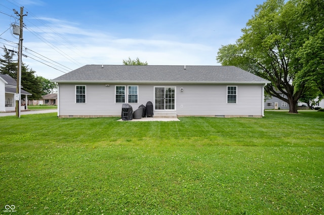 284 E Silver St, Knightstown, IN 46148 - rear view of house featuring crawl space, a lawn, and a patio area