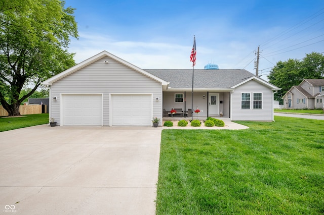284 E Silver St, Knightstown, IN 46148 - ranch-style home with a porch, concrete driveway, an attached garage, and a shingled roof
