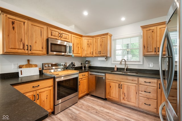 284 E Silver St, Knightstown, IN 46148 - kitchen with stainless steel appliances, lofted ceiling, recessed lighting, and light wood finished floors