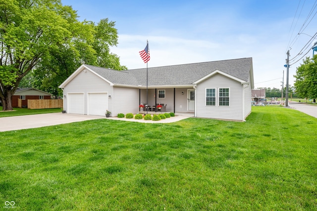 284 E Silver St, Knightstown, IN 46148 - ranch-style house with concrete driveway, an attached garage, and roof with shingles