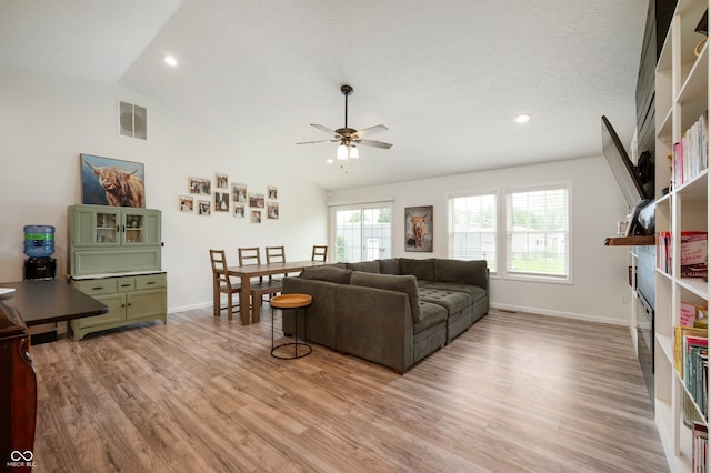 284 E Silver St, Knightstown, IN 46148 - living room featuring ceiling fan, lofted ceiling, light wood-style flooring, recessed lighting, and a textured ceiling