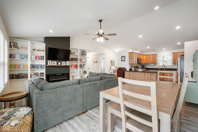284 E Silver St, Knightstown, IN 46148 - living room featuring vaulted ceiling, light wood-type flooring, a ceiling fan, and recessed lighting