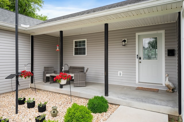 284 E Silver St, Knightstown, IN 46148 - doorway to property featuring a shingled roof
