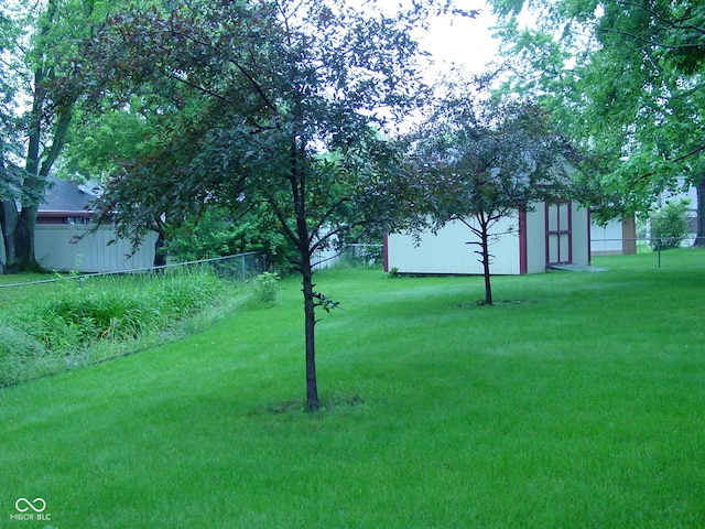1808 Orchid Ct, Indianapolis, IN 46219 - view of yard with a storage unit
