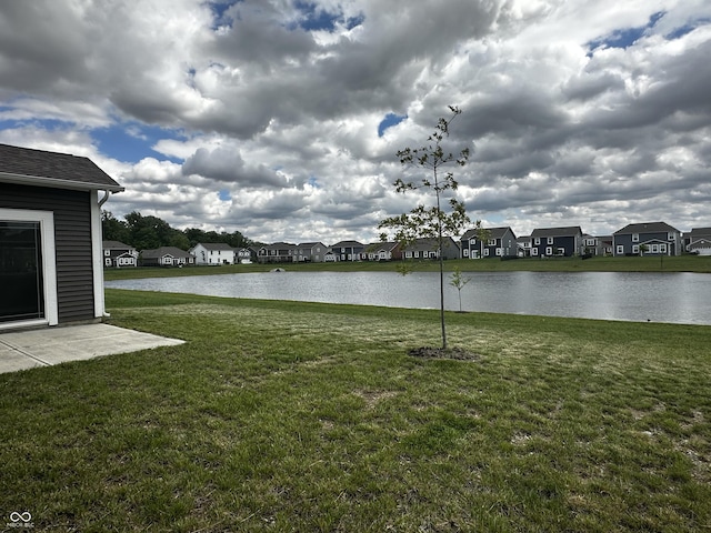 6729 Birmingham Ave, Mccordsville, IN 46055 - view of green lawn with a residential view and a water view