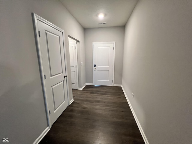 6729 Birmingham Ave, Mccordsville, IN 46055 - corridor with dark wood-style floors and baseboards