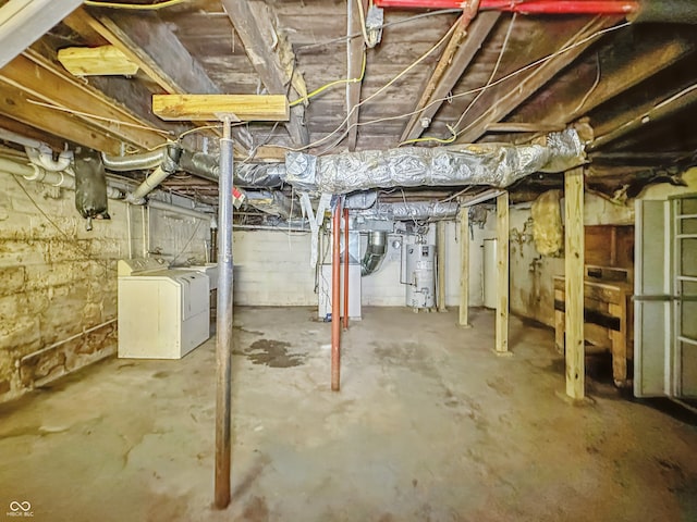 1011 W 7th St, Anderson, IN 46016 - unfinished below grade area with gas water heater and independent washer and dryer