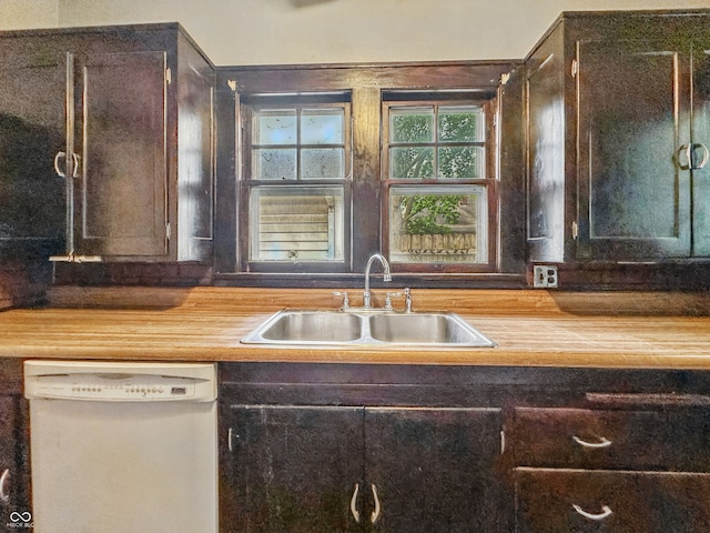 1011 W 7th St, Anderson, IN 46016 - kitchen featuring white dishwasher, wooden counters, and dark brown cabinetry