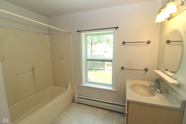 611 E Wabash Ave, Crawfordsville, IN 47933 - full bath featuring baseboard heating, vanity, and bathing tub / shower combination