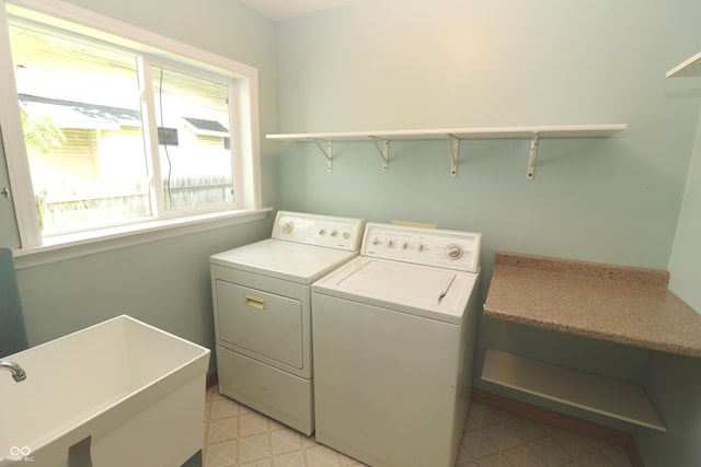 611 E Wabash Ave, Crawfordsville, IN 47933 - laundry area with plenty of natural light and washer and dryer
