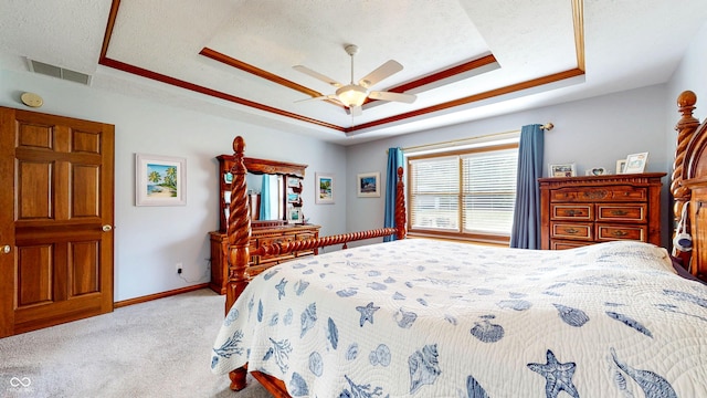 8818 Mathews Rd, Indianapolis, IN 46259 - carpeted bedroom with a tray ceiling and ceiling fan