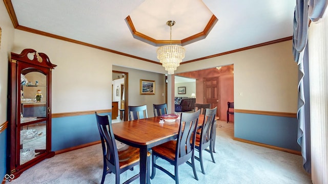 8818 Mathews Rd, Indianapolis, IN 46259 - dining area featuring a chandelier, light colored carpet, and ornamental molding