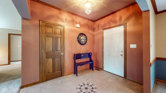 8818 Mathews Rd, Indianapolis, IN 46259 - foyer with crown molding and light tile patterned floors