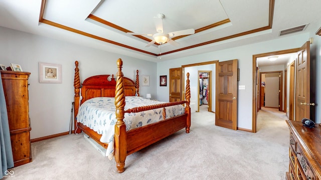 8818 Mathews Rd, Indianapolis, IN 46259 - bedroom with a raised ceiling, light carpet, and ceiling fan