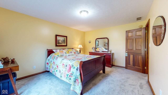 8818 Mathews Rd, Indianapolis, IN 46259 - bedroom featuring light carpet and a textured ceiling