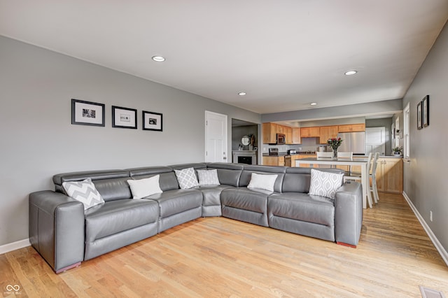 6143 Schoolwood Dr, Indianapolis, IN 46224 - living area with light wood finished floors and recessed lighting