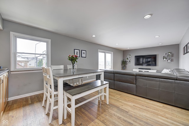 6143 Schoolwood Dr, Indianapolis, IN 46224 - dining room with light wood-style floors and recessed lighting