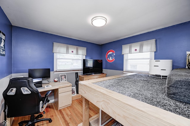 6143 Schoolwood Dr, Indianapolis, IN 46224 - home office featuring healthy amount of natural light and light wood finished floors