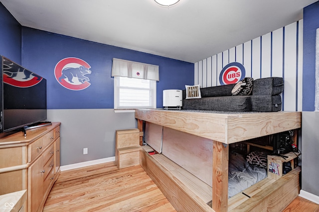 6143 Schoolwood Dr, Indianapolis, IN 46224 - bedroom with wood finished floors and baseboards