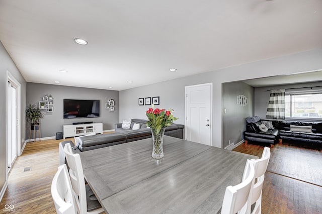 6143 Schoolwood Dr, Indianapolis, IN 46224 - dining area with light wood-style flooring and recessed lighting
