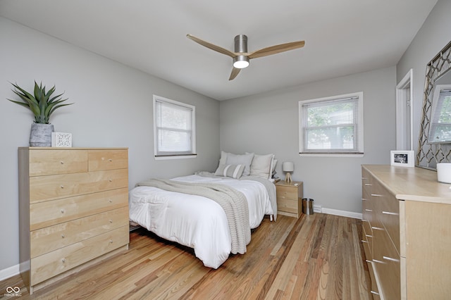 6143 Schoolwood Dr, Indianapolis, IN 46224 - bedroom featuring light wood finished floors and ceiling fan