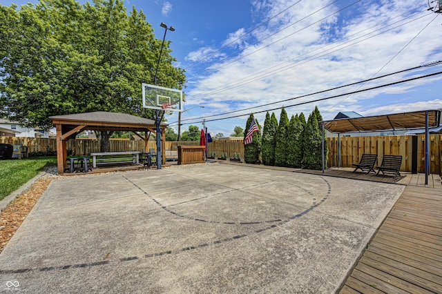 6143 Schoolwood Dr, Indianapolis, IN 46224 - view of basketball court featuring a gazebo and a fenced backyard
