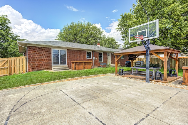 6143 Schoolwood Dr, Indianapolis, IN 46224 - back of property featuring a gazebo, brick siding, entry steps, a chimney, and a deck