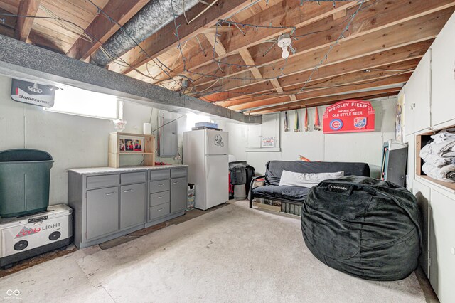 6143 Schoolwood Dr, Indianapolis, IN 46224 - finished basement featuring freestanding refrigerator