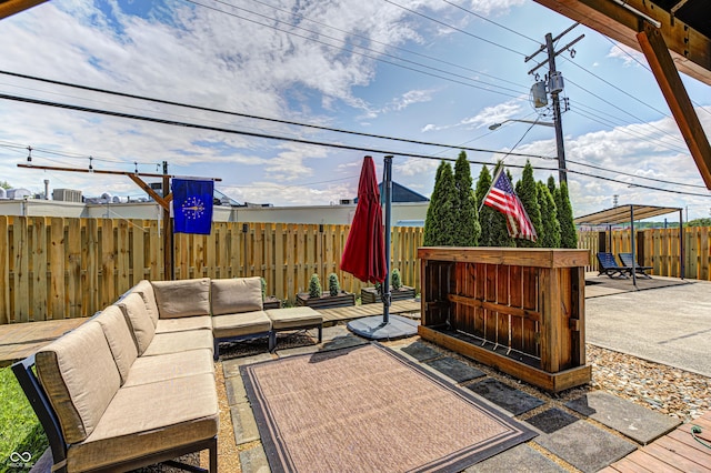 6143 Schoolwood Dr, Indianapolis, IN 46224 - fenced backyard featuring an outdoor hangout area and a patio area