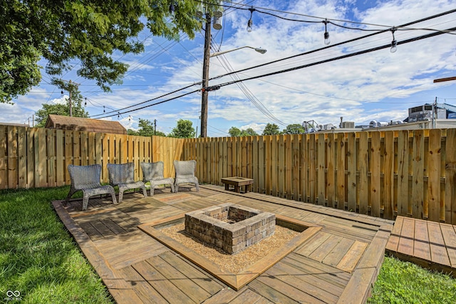 6143 Schoolwood Dr, Indianapolis, IN 46224 - view of patio featuring a fire pit and a deck