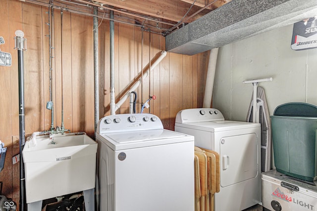 6143 Schoolwood Dr, Indianapolis, IN 46224 - laundry area with washer and clothes dryer and wooden walls