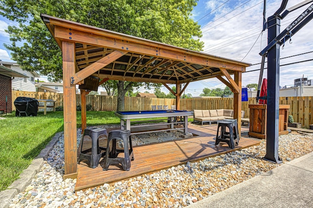 6143 Schoolwood Dr, Indianapolis, IN 46224 - fenced backyard with a gazebo, an outdoor hangout area, area for grilling, and a wooden deck